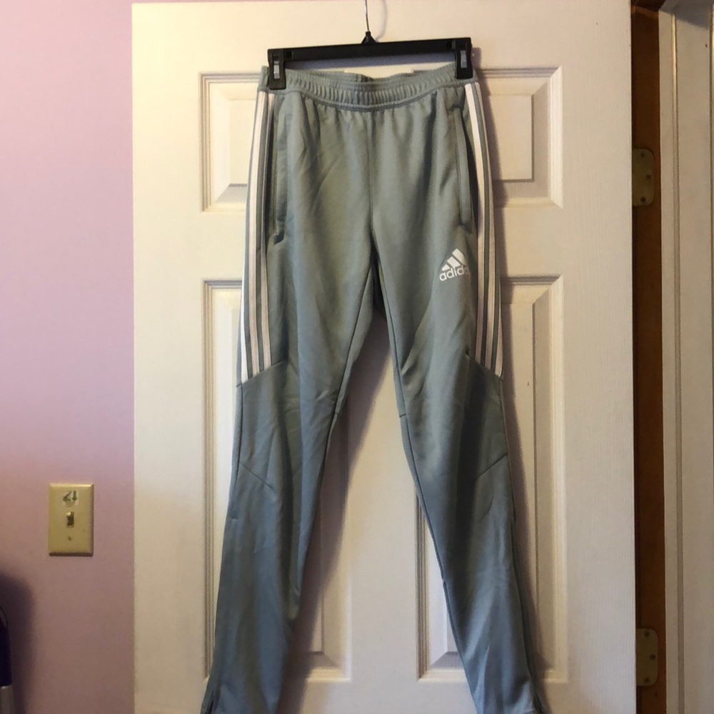 Adidas soccer pants size small.  Bluish gray.  2 very small pulls near left knee